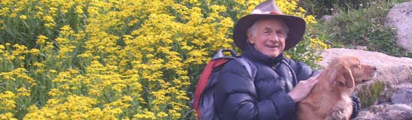 Erik F. Storlie on the trail with his dog